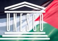 عباس يرفع علم فلسطين فوق مقر اليونسكو 